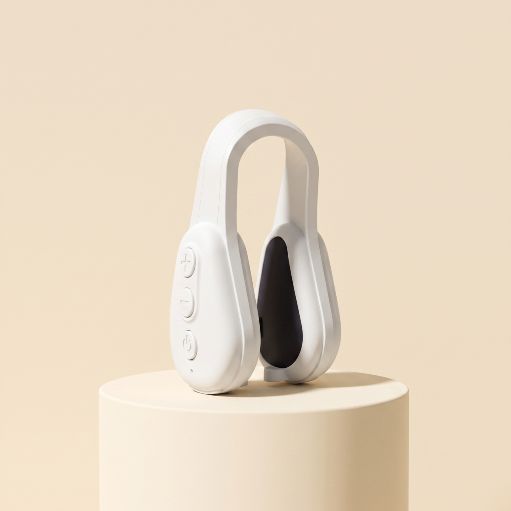 Sculpté device standing upright on a cream pedestal